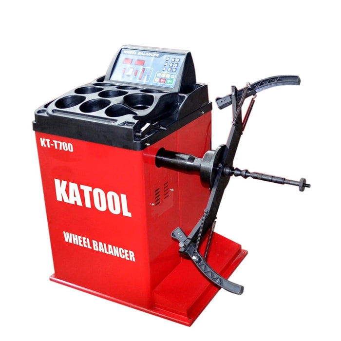 Katool KT-MC2 Motorcycle Wheel Adaptor installed on a wheel balancer