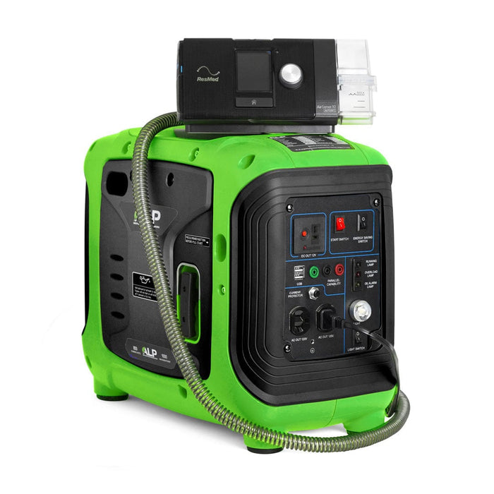 ALP 1000W Portable Powered Generator in Green and Black Color charging a medical device