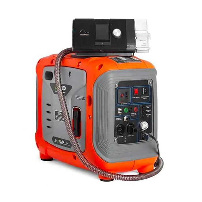 ALP 1000W Portable Powered Generator in Orange and Grey Color charging a medical device