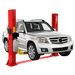 A white SUV is elevated on the red AMGO Hydraulics BP-12 12,000 lbs 2 Post Lift, a heavy-duty hydraulic car lift, for maintenance or repair.