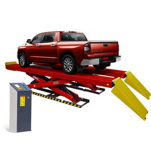 Red pickup truck on a red AMGO Hydraulics AX-12 12,000 lbs Scissor Lift with a control panel on the left.