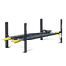 The AMGO Hydraulics 408-P-DX (Combo) 8,000 lbs 4 Post Parking Lift, featuring four posts and yellow ramps at the front with "AMGO" branding visible on the side, is designed for vehicle maintenance.