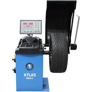 Atlas TC755EZ Tire Changer + WB49-2-PRO Wheel Balancer Combo Package with a tire mounted