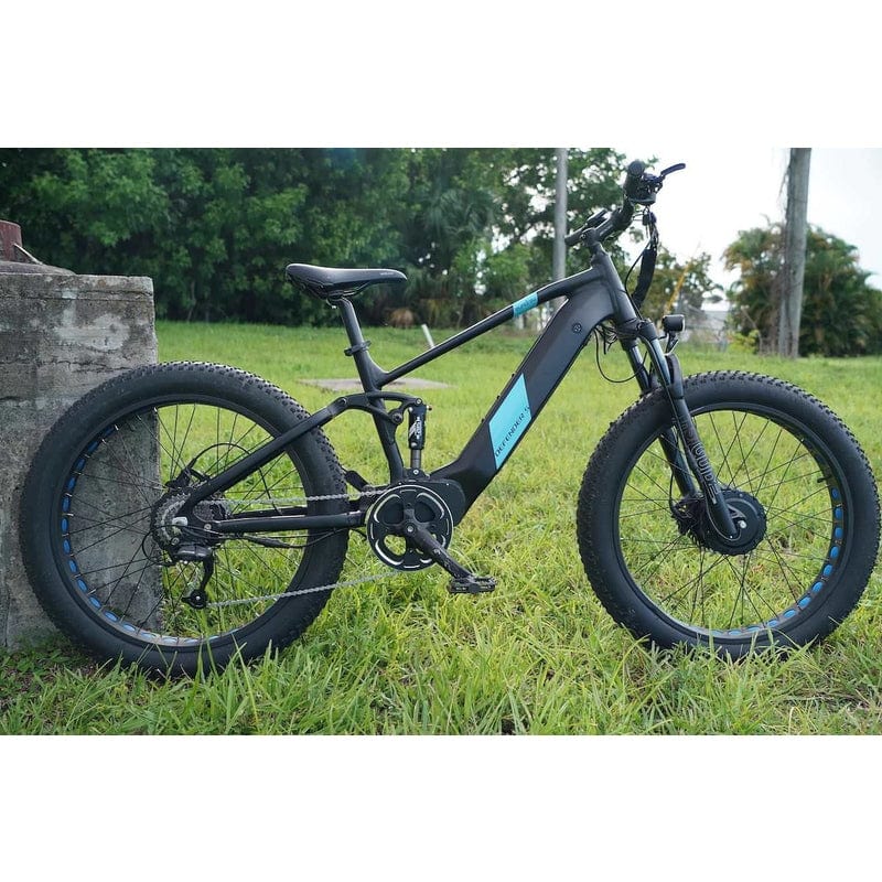Eunorau Defender-S Dual Motor Fat Tire Electric Mountain Bike in the grass