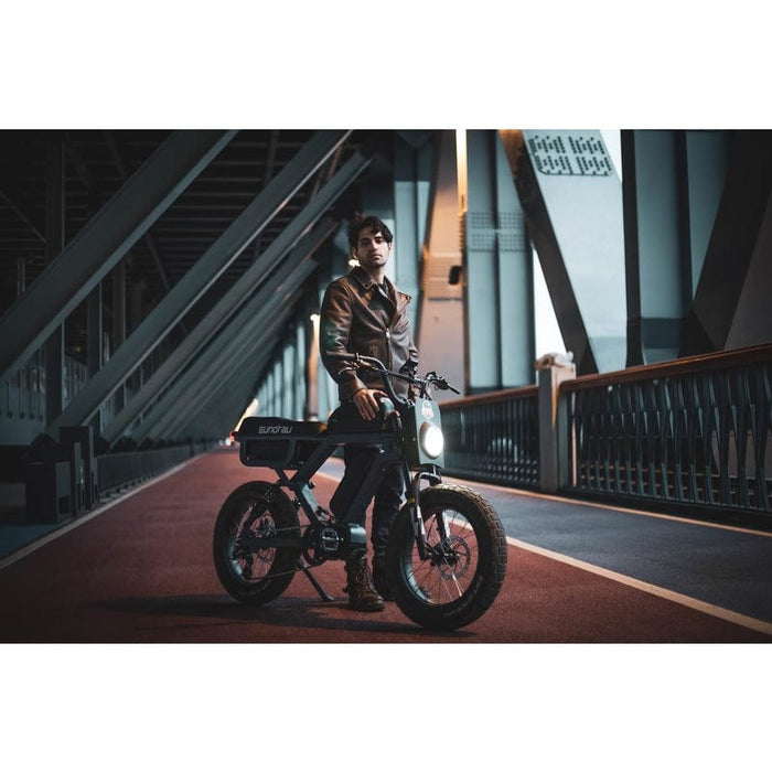 Man riding Eunorau Flash Folding Electric Commuter Bike - 8