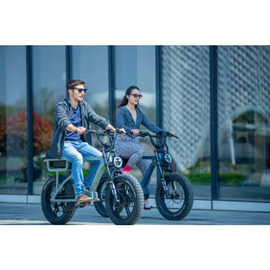 Couples riding Eunorau Flash Folding Electric Commuter Bike