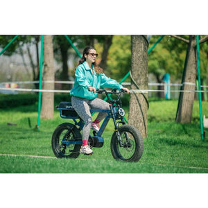 Woman riding Eunorau Flash Folding Electric Commuter Bike - 2