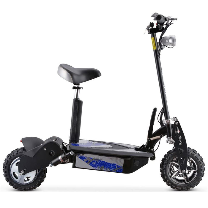 The MotoTec Chaos 2000w 60v Lithium Electric Scooter Black includes a padded seat, rugged tires, and a sleek black frame. Powered by a robust 2000 watt motor and a high-efficiency 60 volt Lithium Battery, the deck proudly displays the brand name "Chaos".