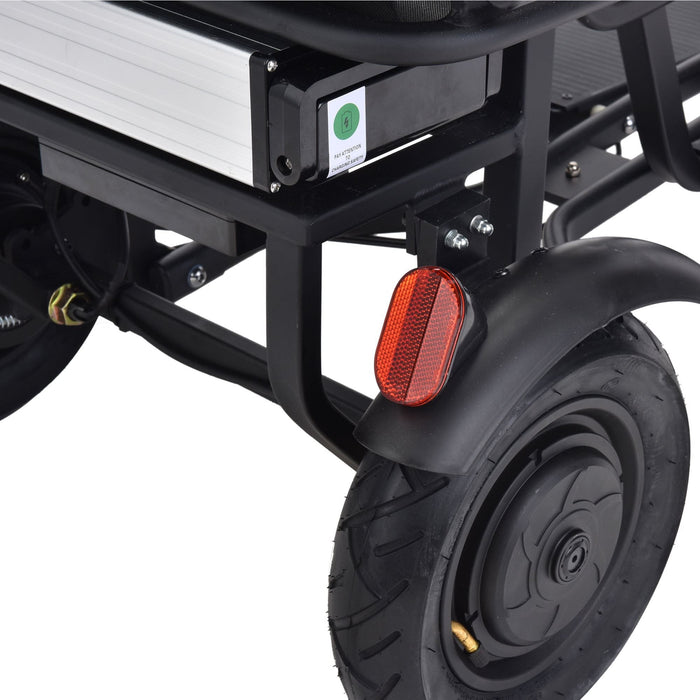 Close-up of the rear wheel and reflector of a MotoTec Folding Mobility Electric Trike 48v 700w Dual Motor Lithium Black with three-wheel styling.