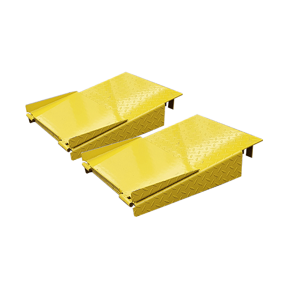 Pair of yellow foldable drive-on ramps with diamond-plate surface