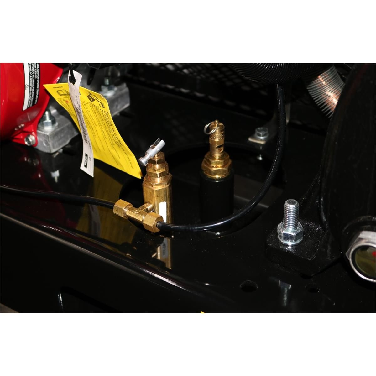 Brass air fittings and pressure-relief valve on the Atlas AF13 tank deck