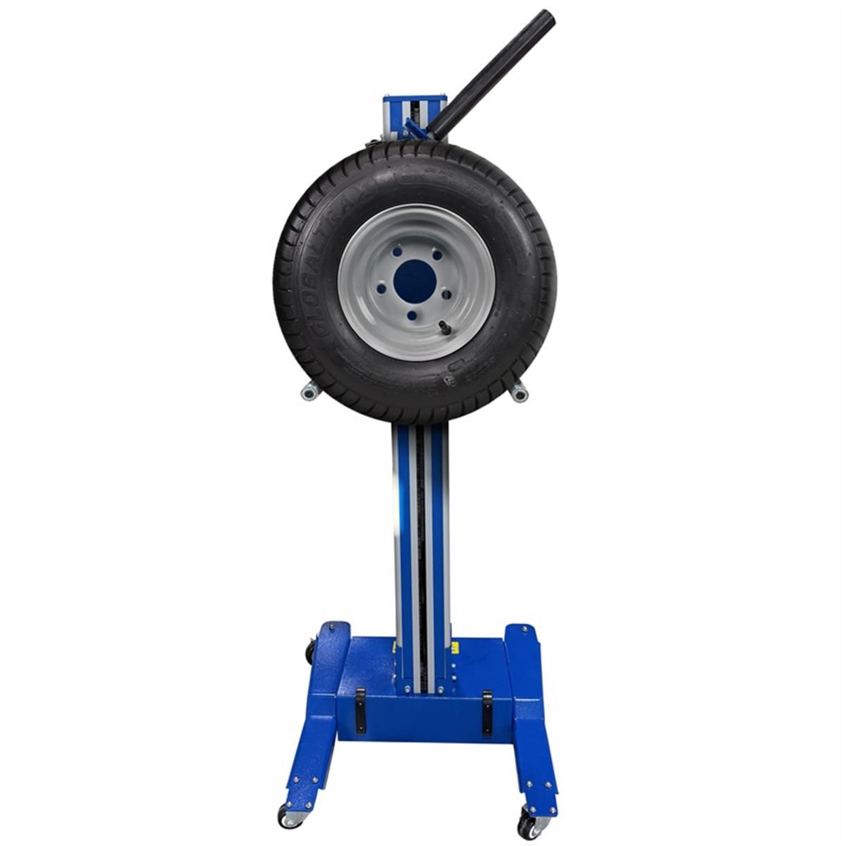Wheel lift raised, holding a mounted wheel and tire on its roller arms