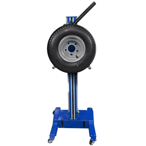 Wheel lift raised, holding a mounted wheel and tire on its roller arms