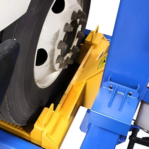 Atlas ML-6051BC adjustable fork engaged with a heavy-truck wheel, fork accommodates 19 to 44 inch tire diameters