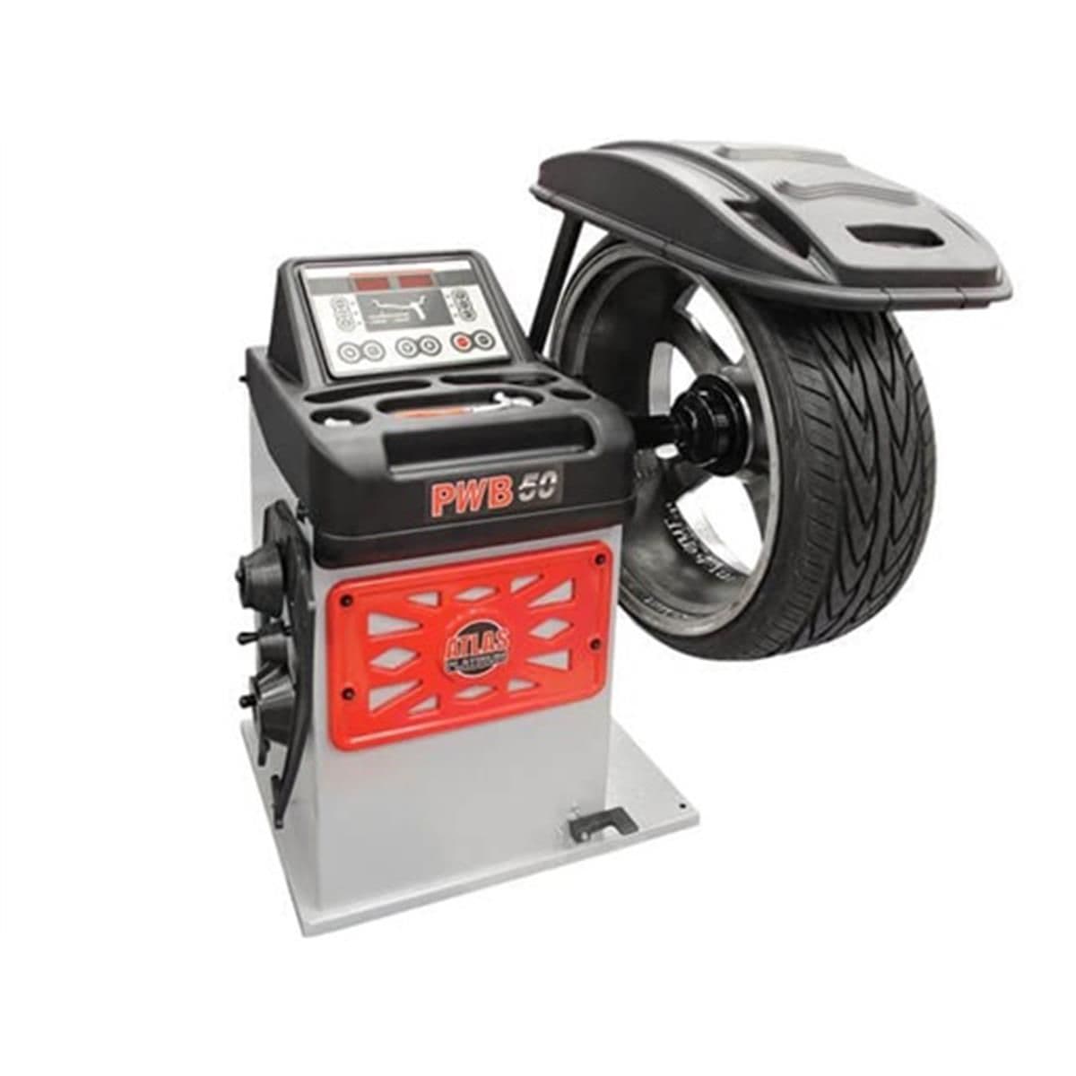 Atlas Platinum PWB50 wheel balancer with a wheel and tire mounted on the 40mm shaft, hood raised