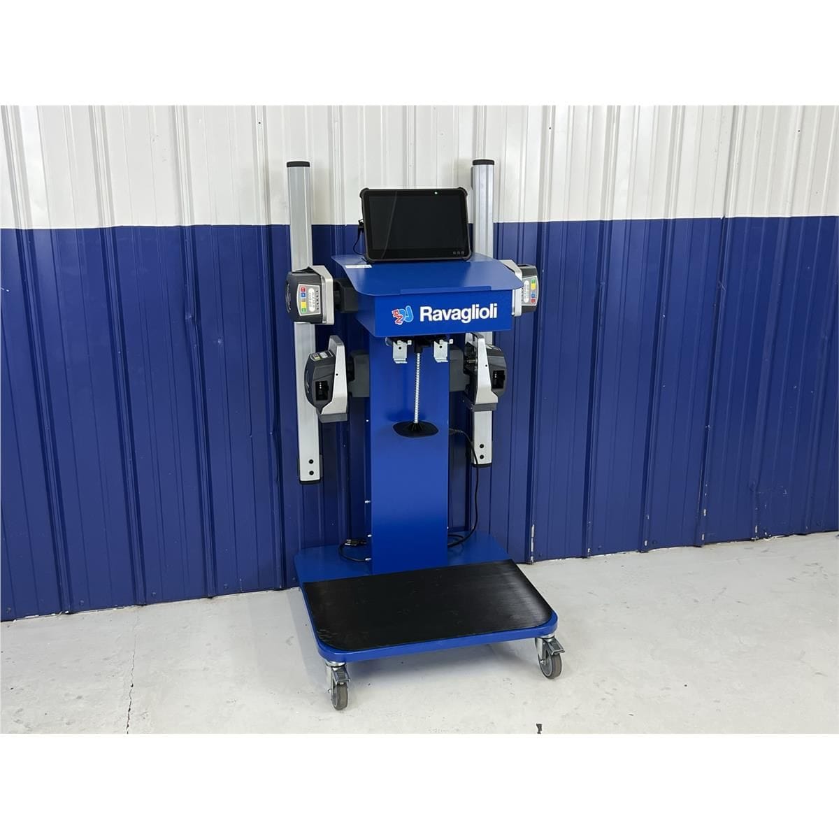Atlas TD6000CNA Spirit alignment cart in commercial shop bay, front view with four sensor heads docked