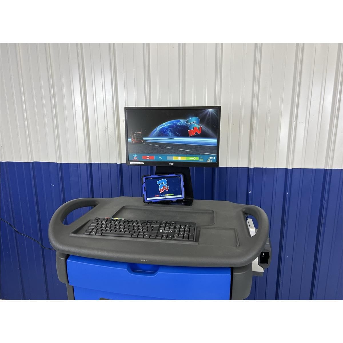 Atlas TD8060NA console with 24-inch monitor, tablet remote viewer, and keyboard tray on Ravaglioli Express cabinet