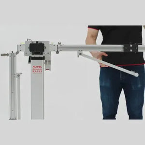 Close-up of the MA600 frame's adjustment mechanism with a technician's hand on the lever