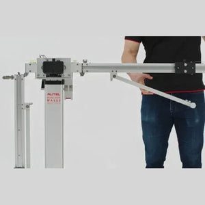 Technician extending MA600 crossbar arm next to the laser measurement unit