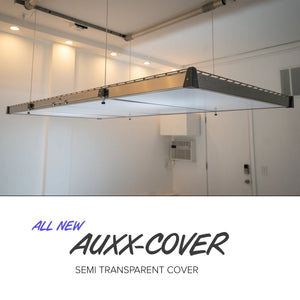 Underside of an Auxx-Lift storage platform fitted with semi-transparent white cover panels with text
