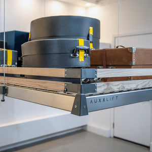 Two-row wood slat Auxx-Guard with metal corner brackets mounted on an Auxx-Lift platform edge