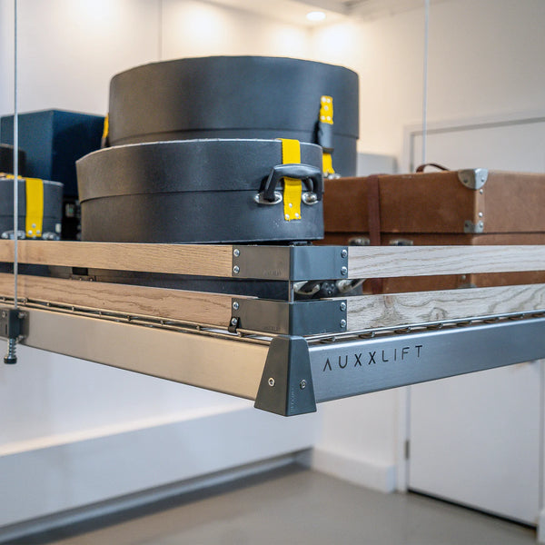 Two-row wood slat Auxx-Guard with metal corner brackets mounted on an Auxx-Lift platform edge