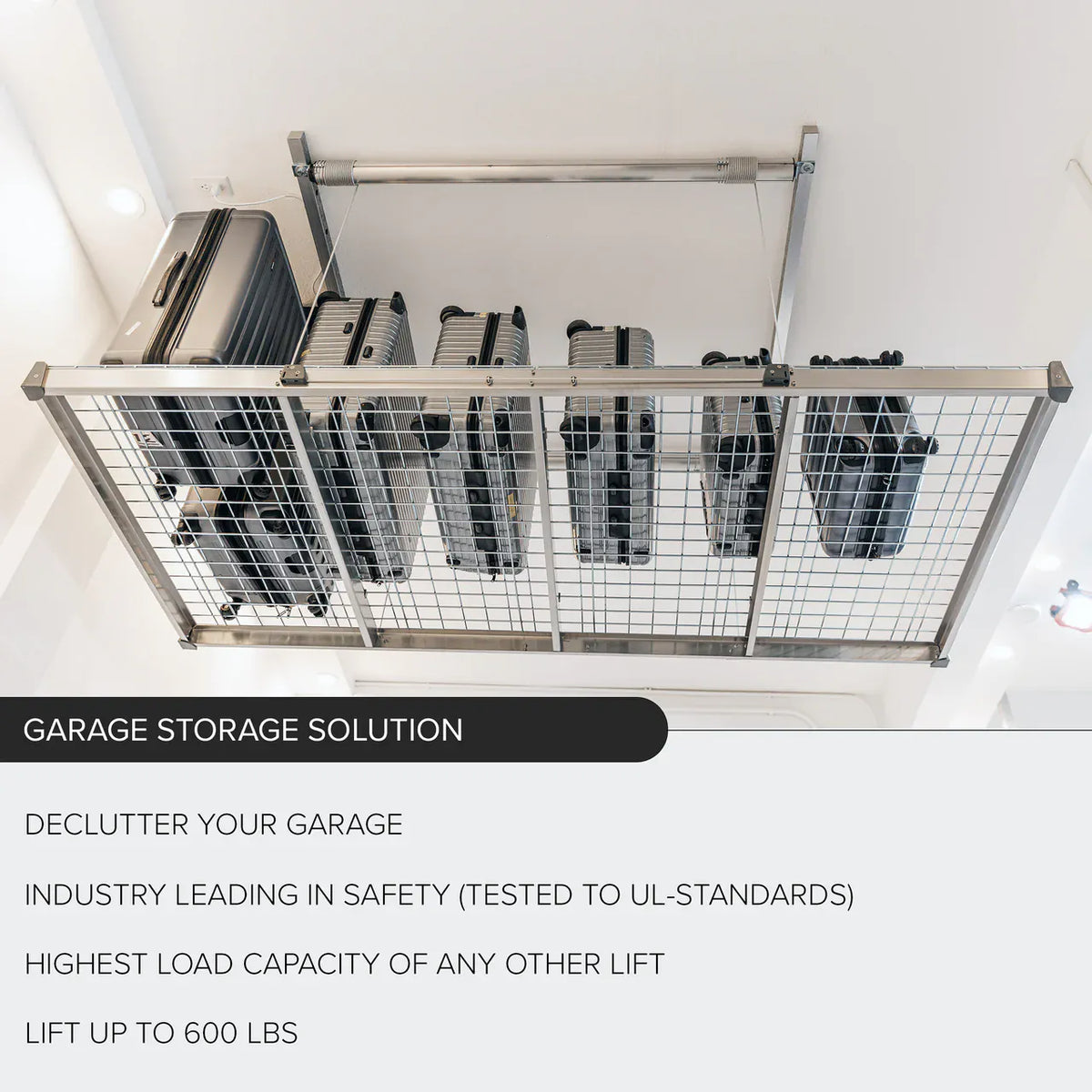 Auxx-Lift platform near the ceiling lined with hard-shell suitcases stored on their sides