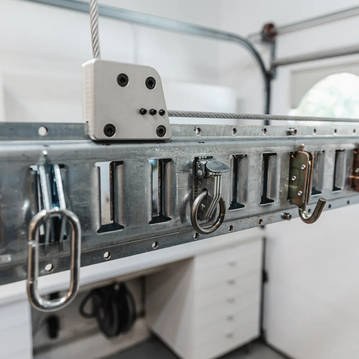 Galvanized E-Beam fitted with snap-in J-hook, round ring, and quick-link attachments