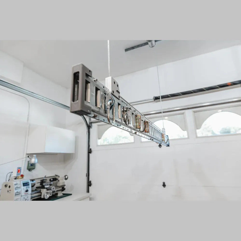 Auxx-One E-Beam frame suspended from the ceiling on a single steel cable