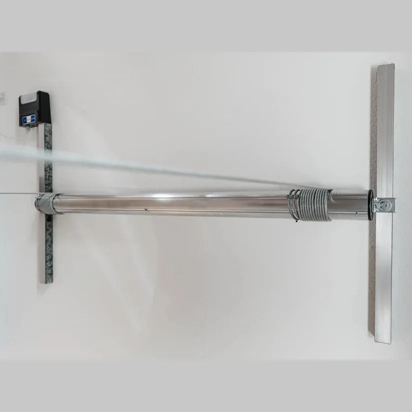 Auxx-One motor mounted between two strut channels with wall-mounted controller box