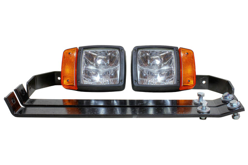 Two halogen snowplow lights with amber turn signals on black mounting brackets with bolts