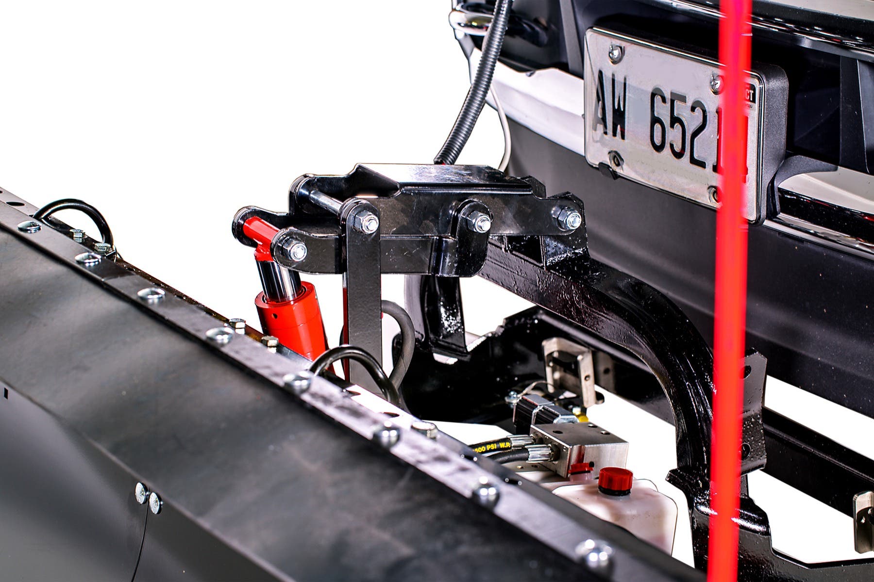 Hydraulic lift cylinder, pump, valve block and reservoir on the Everest plow frame
