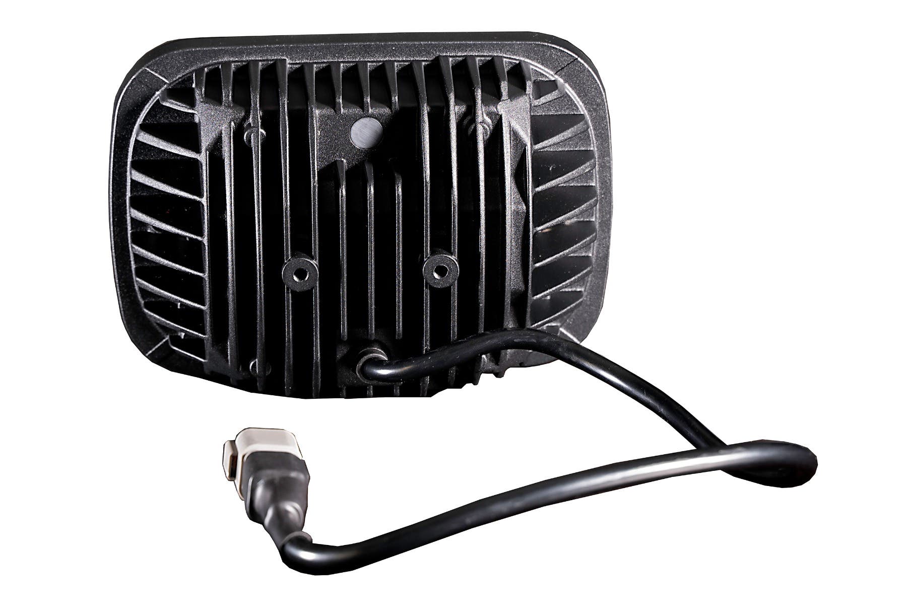 Rear of an LED light showing the finned housing and pigtail connector