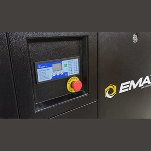 Close-up of the EMAX compressor control panel with digital maintenance display and red emergency-stop button