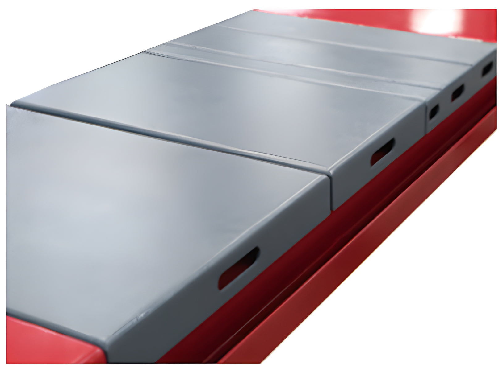 Grey rear slip plates set into the red runway