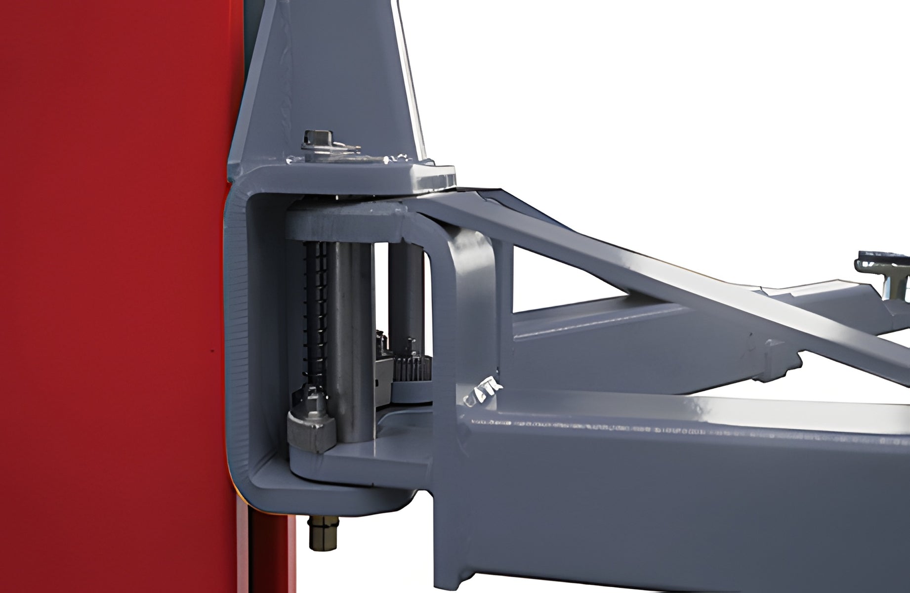 Side view of the automatic arm restraint pin, spring and toothed gear at the arm pivot