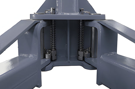 Carriage front view showing both spring-loaded arm restraint gears