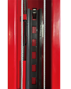 Inside the column: equalizer cables alongside the carriage track