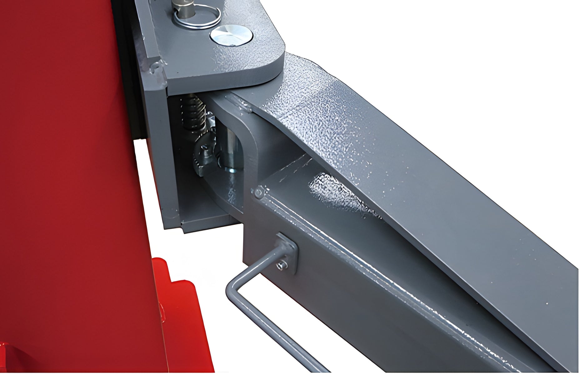 Close-up of the arm restraint at the arm pivot with the arm pull handle