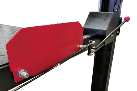Runway end with red stop plate and the manual lock release rod on the post