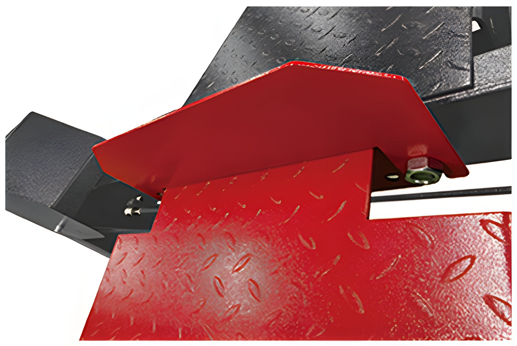 Red approach ramp hinged at the end of the diamond-plate runway