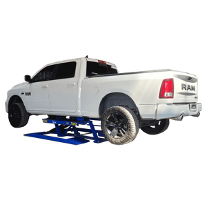 iDeal LR-10K-TLPAD raising a full-size pickup truck, demonstrating wide-vehicle clearance