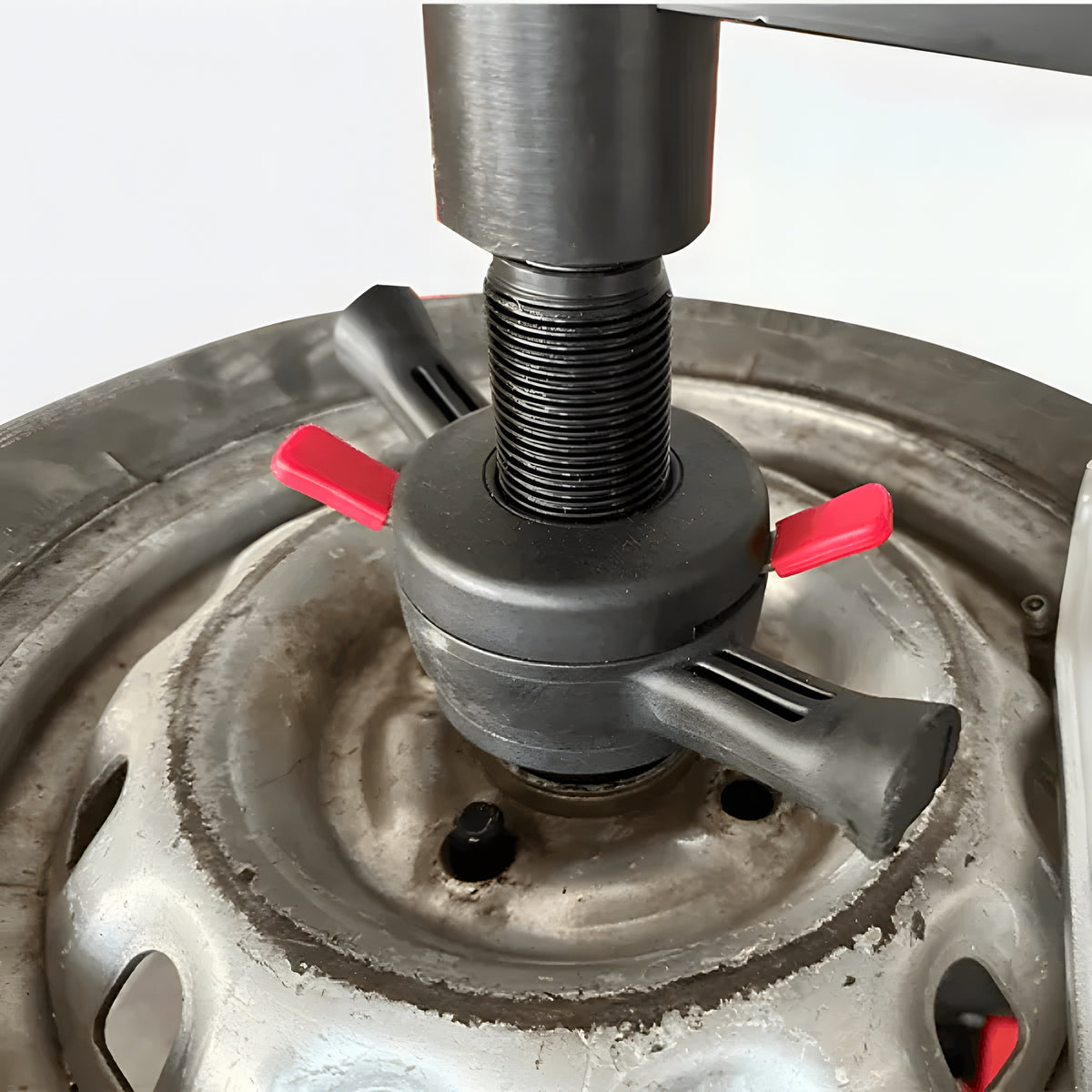 Quick-release locking collar clamping a wheel on the threaded spindle
