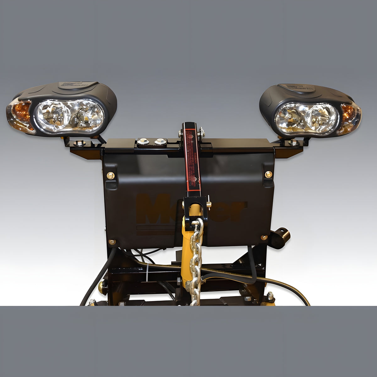 Two plow lights on the light bar above the covered Meyer hydraulic unit, rear view