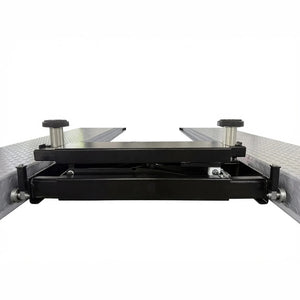 Lowered rolling bridge jack showing cross-rails and end roller wheels on the runways