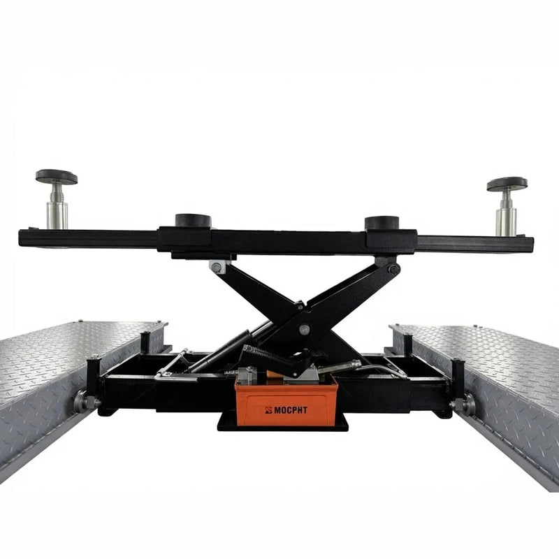 Rolling bridge jack raised on runways showing scissor lift and hydraulic pump