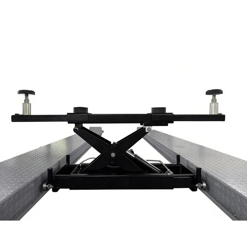 Triumph RJ-5 rolling bridge jack raised between four-post lift runways