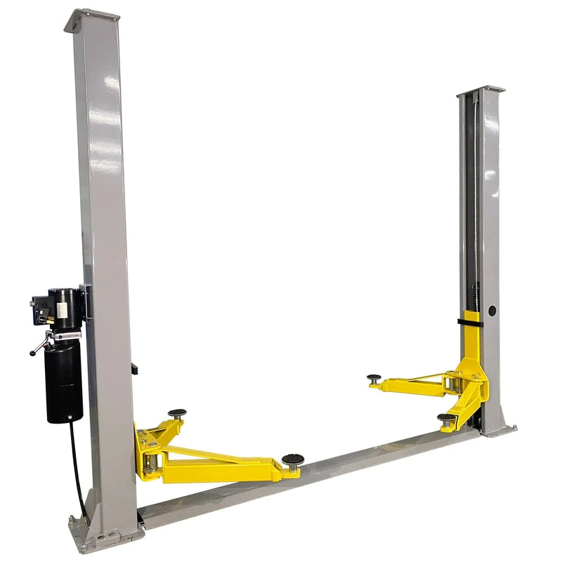 Two-post lift in three-quarter view showing the floor-plate base spanning between the two columns