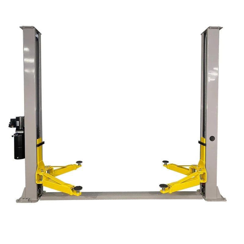 Triumph NT-9 two-post lift, front view with the swing arms folded to the parked position