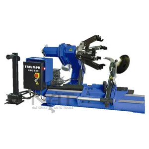 Triumph NTC-650 heavy-duty truck tire changer with extended robotic arm and wireless control pedestal